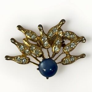 Elegant Gold and Blue Brooch